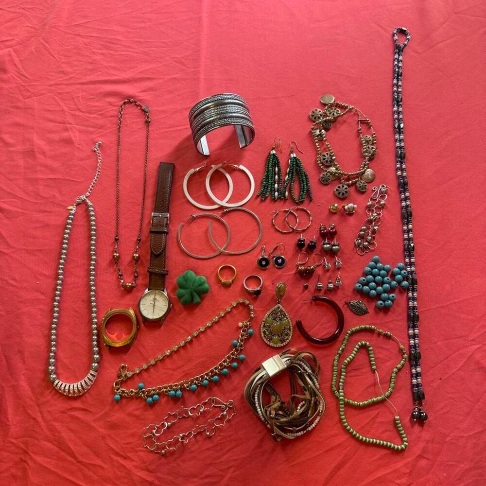 Large lot of costume jewelry & Real Coach watch included!